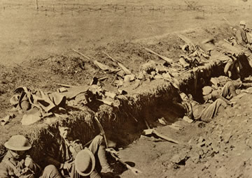 American soldiers in a partially-dug trench